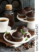 Coffee chocolate muffins for breakfast. Стоковое фото, агентство Ingram Publishing / Фотобанк Лори