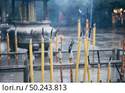Incense burner in a temple in Hong Kong. Стоковое фото, агентство Ingram Publishing / Фотобанк Лори