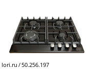 Burners on a black gas cooker in the kitchen. Isolated on white background. Стоковое фото, агентство Ingram Publishing / Фотобанк Лори