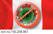 Prohibition sign with crossed out Coronavirus bacteria on the background of Canadian flag. Rapid spread of Coronavirus, Covid 19 in the world. Global calamity. Quarantine concept.. Warning sign with crossed out Coronavirus bacteria on the background of Canadian flag. Стоковое фото, агентство Ingram Publishing / Фотобанк Лори