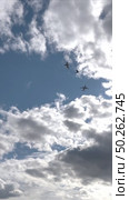 Civilian passenger plane flying in a cloudy sky. 4K vertical video. Стоковое видео, видеограф Кирилл Зотов / Фотобанк Лори