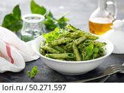 Vegetarian pasta penne with savory spinach sauce. Стоковое фото, агентство Ingram Publishing / Фотобанк Лори
