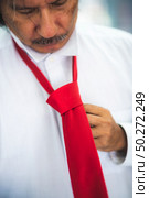 unemployed businessman, Businessmen are disappointed and worried because they are losing their jobs. Стоковое фото, агентство Ingram Publishing / Фотобанк Лори