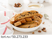 Biscotti cookies with dried cranberry, walnuts and with a cup of coffee . Стоковое фото, агентство Ingram Publishing / Фотобанк Лори