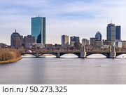 Downtown Cityscape of Boston skyscraper skylines office buildings along Charles River at Boston City Commonwealth of Massachusetts in New England United States. Photographing from Cambridge Side. Стоковое фото, агентство Ingram Publishing / Фотобанк Лори