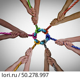 Diverse employees team meeting as a business concept for pulling together for work teamwork success and diversity symbol as a unified group working in unity. Стоковое фото, агентство Ingram Publishing / Фотобанк Лори