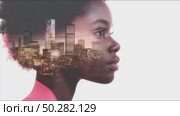 Double exposure of a thoughtful African American woman and urban skyline. Стоковое AI-видео, аниматор Анастасия Золотницкая / Фотобанк Лори
