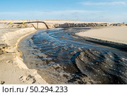 Sediment transposition intervention to the Atlantic Ocean to optimize the hydrodynamic balance in Ovar, Portugal. Стоковое фото, агентство Ingram Publishing / Фотобанк Лори