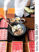 Cooking of japanese wagyu beef Sukiyaki set. Стоковое фото, агентство Ingram Publishing / Фотобанк Лори