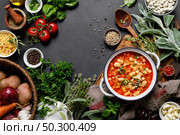 Cooking pasta e fagioli soup with chicken meat and vegetables, italian cuisine. Стоковое фото, агентство Ingram Publishing / Фотобанк Лори