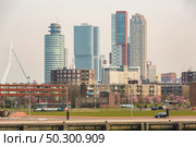 Cityscape and beautiful Donwtown city of Rotterdam the Netherlands. Transportation landmark Tourism concept. Стоковое фото, агентство Ingram Publishing / Фотобанк Лори