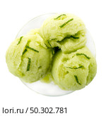 Close up of melon flavored ice-cream isolated on white background. Стоковое фото, агентство Ingram Publishing / Фотобанк Лори