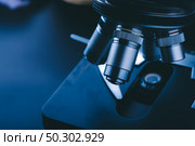 Hight technology microscope at science laboratory for technician using in a histological sample education, a biopsy in the laboratory of research. Стоковое фото, агентство Ingram Publishing / Фотобанк Лори