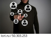 Man’s hand with phone circles and integrate people communicate flat icons.  Communication technology concept. Стоковое фото, агентство Ingram Publishing / Фотобанк Лори