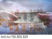 Give a money United States dollar (USD) Стоковое фото, агентство Ingram Publishing / Фотобанк Лори