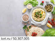Chickpea hummus with green olives. Стоковое фото, агентство Ingram Publishing / Фотобанк Лори