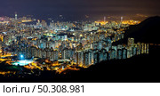panorama cityscape view of Hong Kong at night, the atmosphere of night lights in the city of the harbor, trade, transportation and international export. panorama cityscape view of Hong Kong at night, the atmosphere of night lights in the city of the harbor, trade, transportation and international export of China. Стоковое фото, агентство Ingram Publishing / Фотобанк Лори