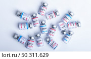 virus vaccine on white background in science laboratory, coronavirus COVID-19 disease medicine infection epidemic flu, health care research. Стоковое фото, агентство Ingram Publishing / Фотобанк Лори