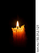 Old candle and drips of wax. Nature closeup object. Стоковое фото, агентство Ingram Publishing / Фотобанк Лори
