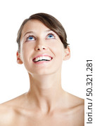 Portrait of a Healthy and young woman smilling and looking to the top. Стоковое фото, агентство Ingram Publishing / Фотобанк Лори