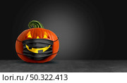 Halloween surgical mask as a jack o lantern pumpkin wearing a medical face protection as an autumn symbol for disease control and virus infection and coronavirus or covid-19 safety on a black background in a 3D illustration style. Стоковое фото, агентство Ingram Publishing / Фотобанк Лори