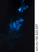 blue smoke against black background. Стоковое фото, агентство Ingram Publishing / Фотобанк Лори