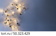 burning garland with spangles table. Стоковое фото, агентство Ingram Publishing / Фотобанк Лори