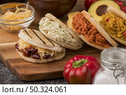 delicious arepas wooden board. Стоковое фото, агентство Ingram Publishing / Фотобанк Лори