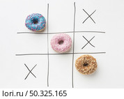 sweet tic tac toe concept top view. Resolution and high quality beautiful photo. sweet tic tac toe concept top view. High quality and resolution beautiful photo concept. Стоковое фото, агентство Ingram Publishing / Фотобанк Лори