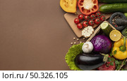 flat lay basket organic vegetables with copy space. Resolution and high quality beautiful photo. flat lay basket organic vegetables with copy space. High quality beautiful photo concept. Стоковое фото, агентство Ingram Publishing / Фотобанк Лори