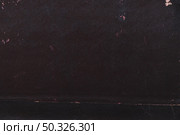 macro photo old black book cover texture. Resolution and high quality beautiful photo. macro photo old black book cover texture. High quality beautiful photo concept. Стоковое фото, агентство Ingram Publishing / Фотобанк Лори