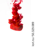 vivid red droplet ink. High resolution photo. vivid red droplet ink. High quality photo. Стоковое фото, агентство Ingram Publishing / Фотобанк Лори