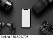 graphy concept with camera accesories smartphone middle. High resolution photo. graphy concept with camera accesories smartphone middle. High quality photo. Стоковое фото, агентство Ingram Publishing / Фотобанк Лори