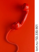top view telephone receiver with cord. High resolution photo. top view telephone receiver with cord. High quality photo. Стоковое фото, агентство Ingram Publishing / Фотобанк Лори