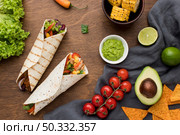 top view delicious mexican food with guacamole. High resolution photo. top view delicious mexican food with guacamole. High quality photo. Стоковое фото, агентство Ingram Publishing / Фотобанк Лори