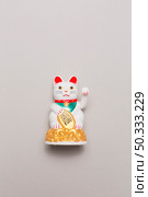 chinese lucky cat. Стоковое фото, агентство Ingram Publishing / Фотобанк Лори
