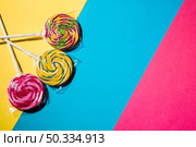 colorful lollipops candies striped colorful background. Стоковое фото, агентство Ingram Publishing / Фотобанк Лори