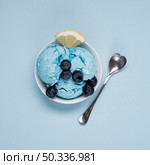 top view tasty ice cream with spoon table. Стоковое фото, агентство Ingram Publishing / Фотобанк Лори