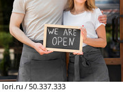 couple reopening small business. Стоковое фото, агентство Ingram Publishing / Фотобанк Лори