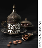 turkish cup coffee with coffee beans. Стоковое фото, агентство Ingram Publishing / Фотобанк Лори