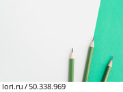 green sharp pencils dual background. Стоковое фото, агентство Ingram Publishing / Фотобанк Лори