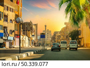 Road and street of Luxor town at sunset. Стоковое фото, агентство Ingram Publishing / Фотобанк Лори