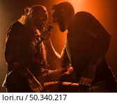 long hair guitar guy vocalist duet singing. Стоковое фото, агентство Ingram Publishing / Фотобанк Лори