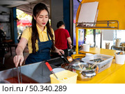 medium shot woman working. Стоковое фото, агентство Ingram Publishing / Фотобанк Лори