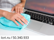 woman hand cleaning laptop home. Стоковое фото, агентство Ingram Publishing / Фотобанк Лори