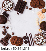 empty frame made with chocolates products white background. Стоковое фото, агентство Ingram Publishing / Фотобанк Лори