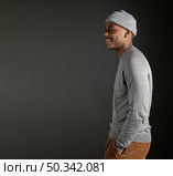 side view male wearing cap. Стоковое фото, агентство Ingram Publishing / Фотобанк Лори