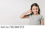 girl showing call sign studio. Стоковое фото, агентство Ingram Publishing / Фотобанк Лори