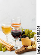 wine tasting with cheese assortments. Стоковое фото, агентство Ingram Publishing / Фотобанк Лори