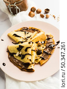 chocolate crepe. Стоковое фото, агентство Ingram Publishing / Фотобанк Лори
